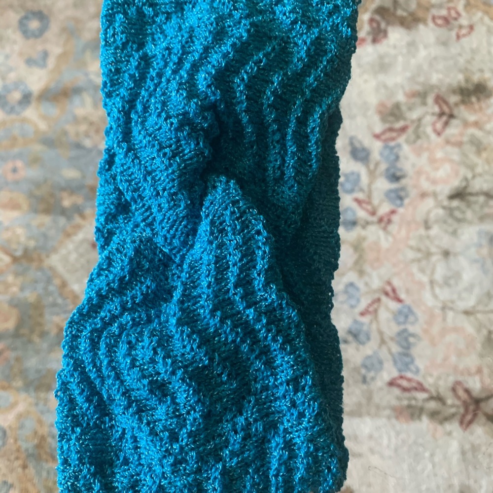 Had band, hand crafted knit